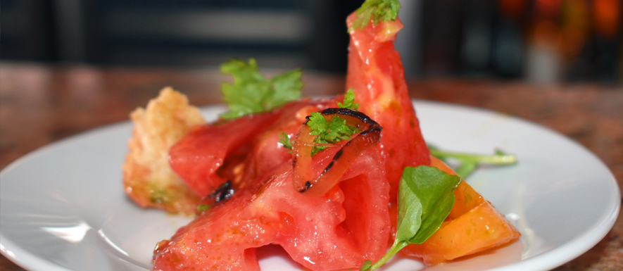 Heirloom tomato salad with charred onion and herbs