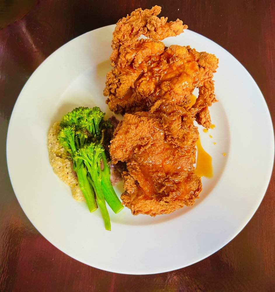 Buttermilk fried chicken with grits and broccolini